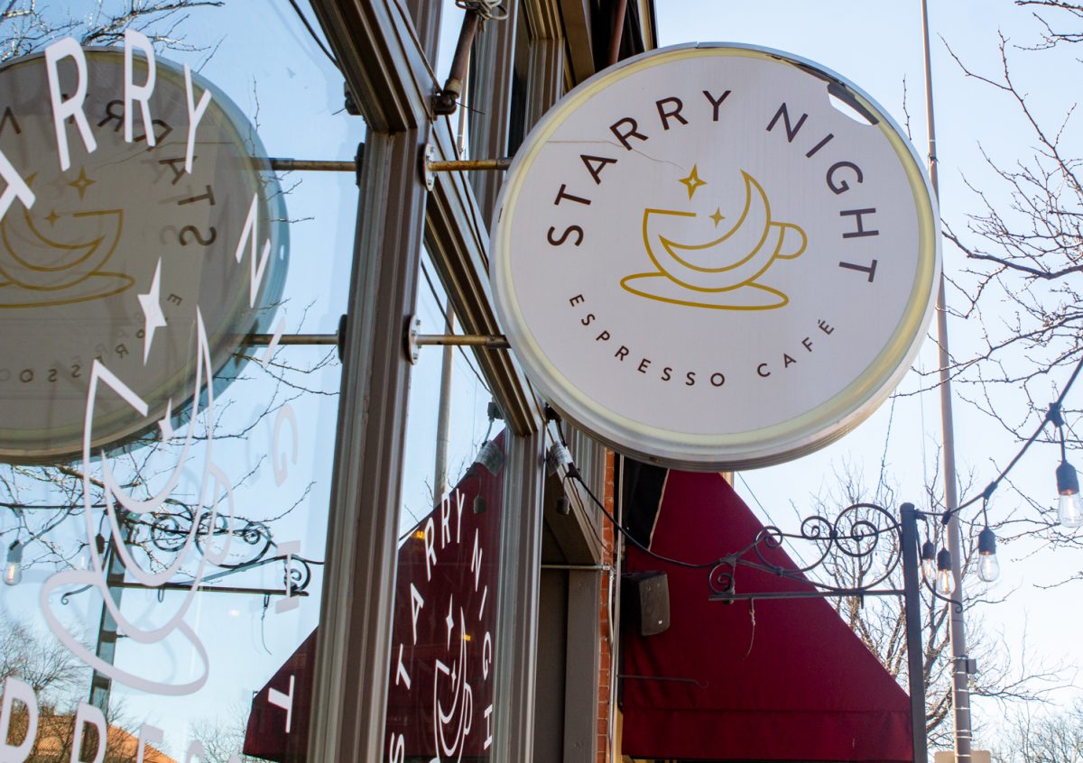 A sign fastened to the windowpane reads "Starry Night Espresso Cafe"