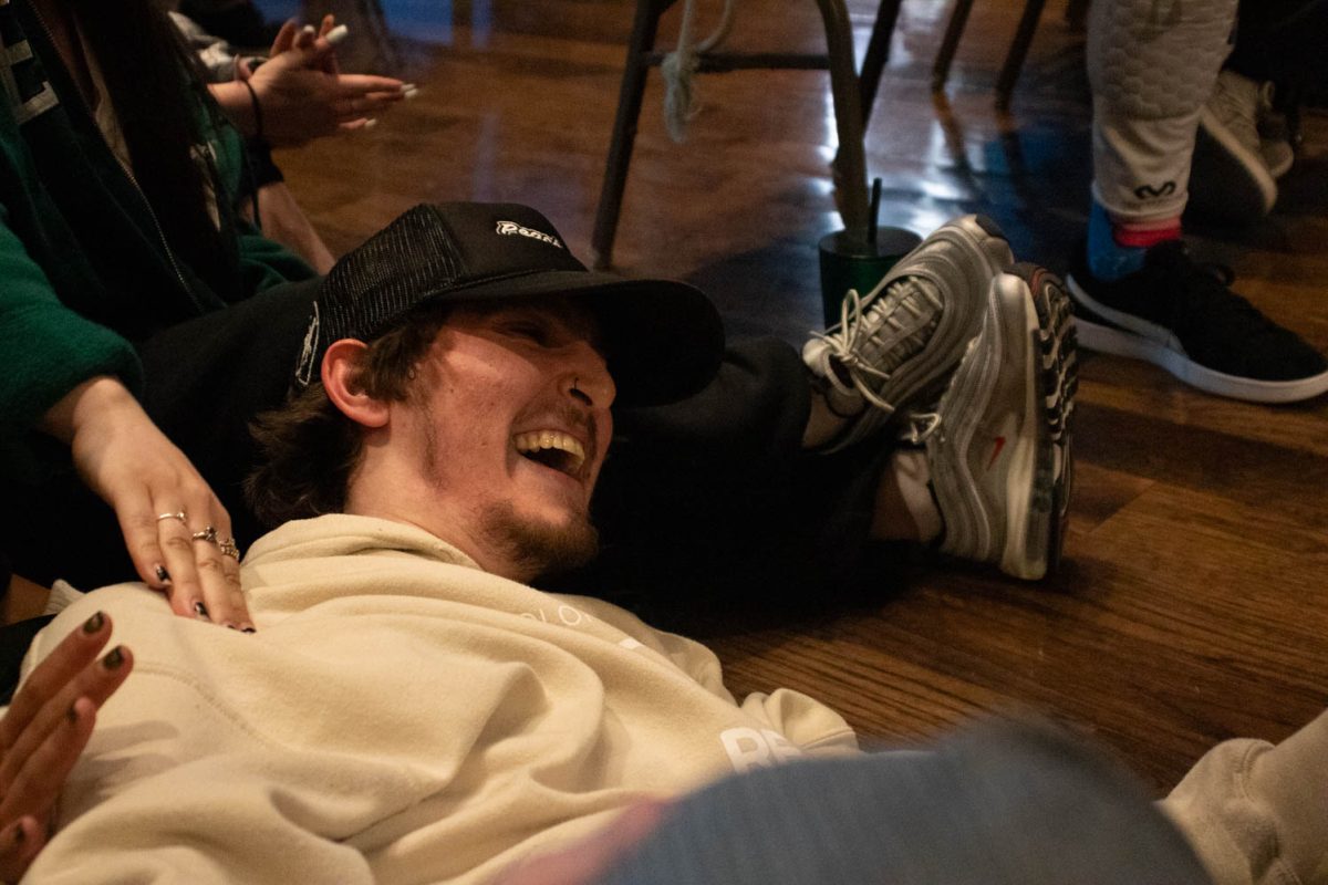A member of King Carlo and Brother Josh's duo laughs after falling at the end of his performance during a 2v2 battle for Vision: Provoke Imagination March 30.