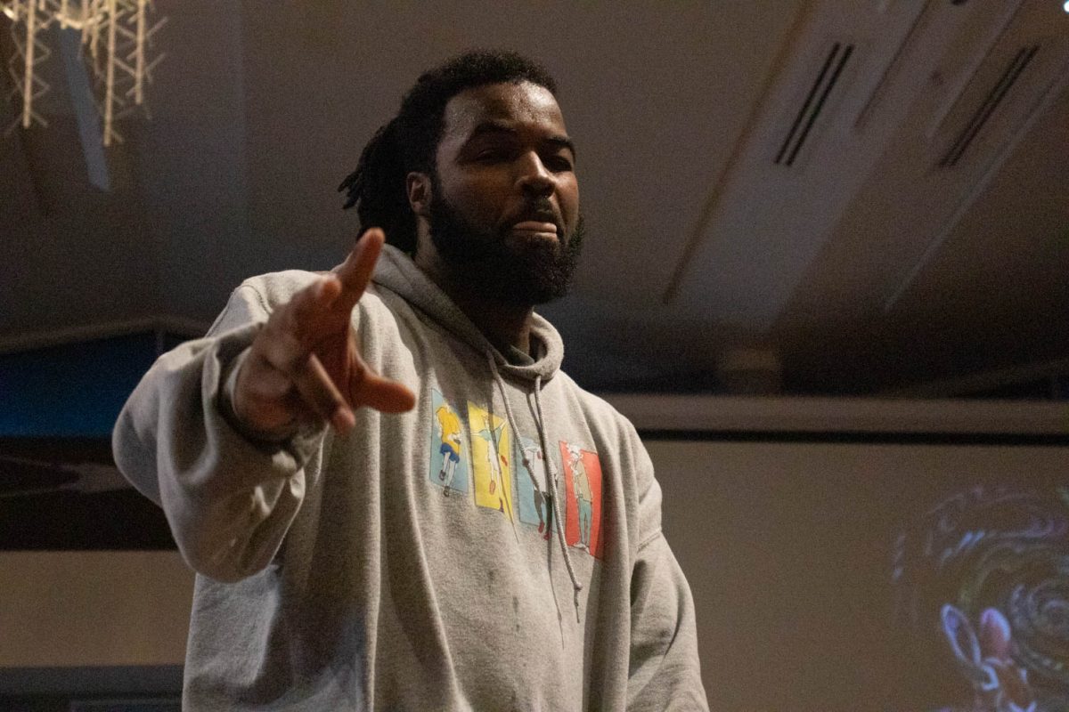 A member of the duo Candy Yamz begins his performance during the final battle of the 2v2 dance battles during Vision:Provoke Imagination March 30 at Colorado State University.