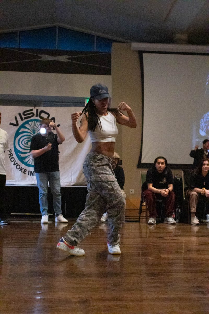 A member of the duo Candy Yamz performs during the final battle of the 2v2 dance battles during Vision: Provoke Imagination March 30 at Colorado State University.