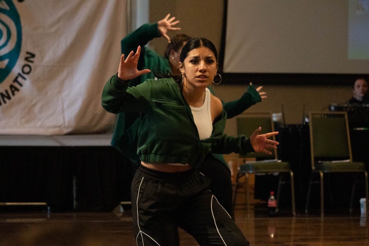 A group member performs during Vision: Provoke Imagination March 30.