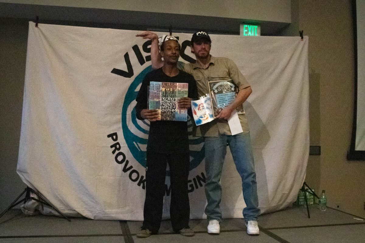 The members of TNX pose after recieving their reward for taking first place in a 2v2 dance battle bracket during Vision:Provoke Imagination March 30.