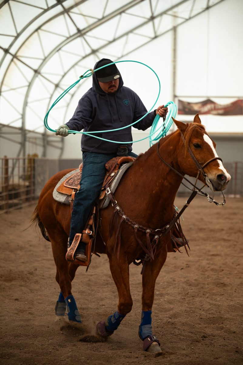 Dominick Lopez rides his horse at a Colorado State University rodeo team practice in Nuun, Colorado.