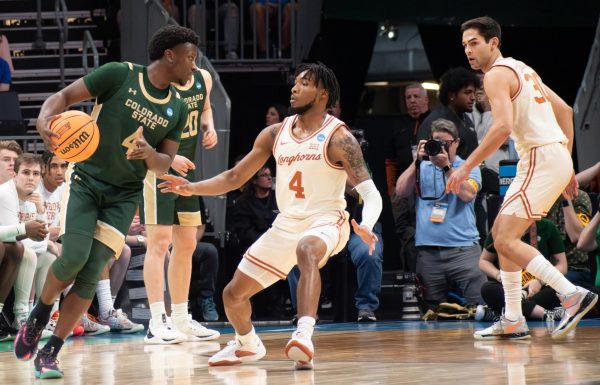 Colorado State University guard Isaiah Stevens dribbles the ball at the top of the arc against The University of Texas at Austin in the NCAA tournament March 21. CSU lost 56-44.
