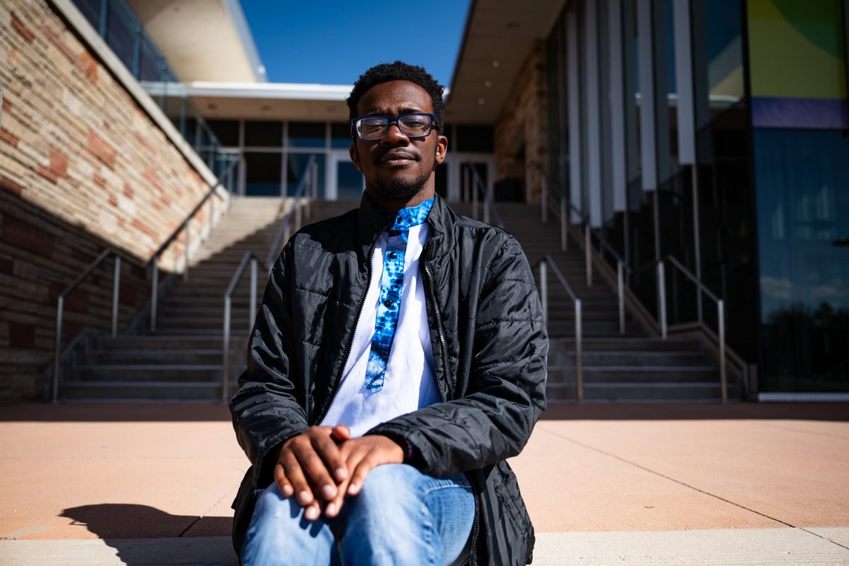 ASCSU Speaker of the Senate Candidate Enock Monati poses for a photo.