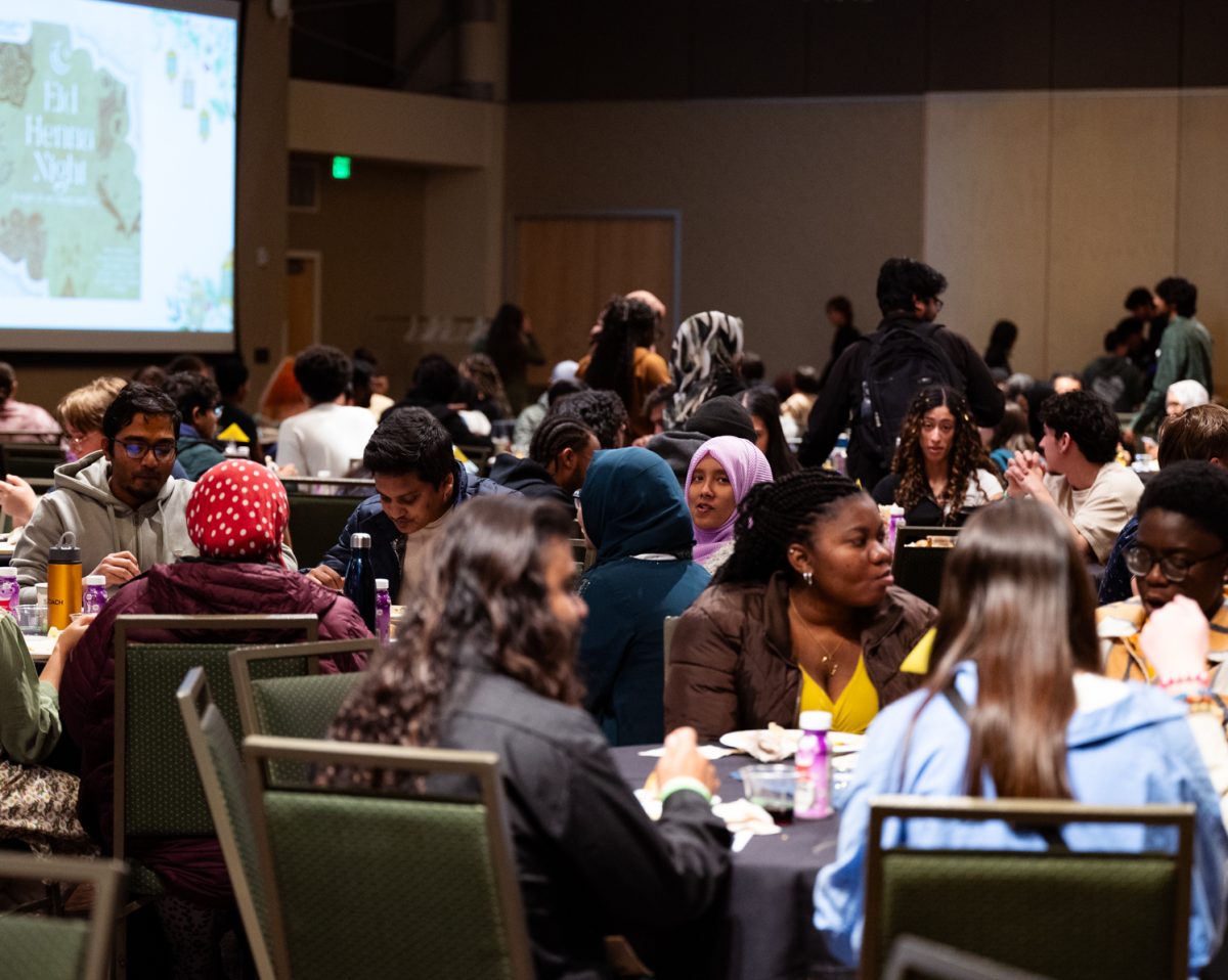 People gathered at the Ramadan Iftar Dinner Event to eat as a community in the Lory Student Center Ballroom.