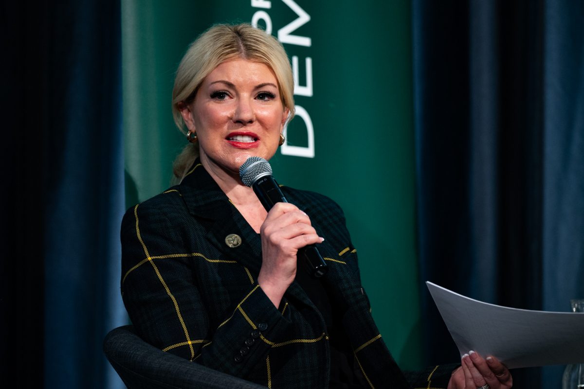 Colorado State University President Amy Parsons introduces a new question for the panel at the Conversation on the First Amendment and Higher Education.