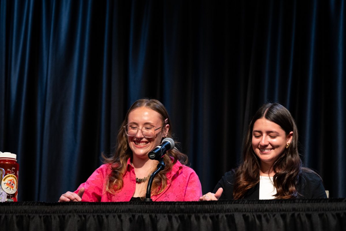 ASCSU Presidential Candidate Jorja Whyte and her running mate Vice Presidential Leticia Madrigal-Tapia smile as they are introduced during the ASCSU Presidential and Vice Presidential Debates.