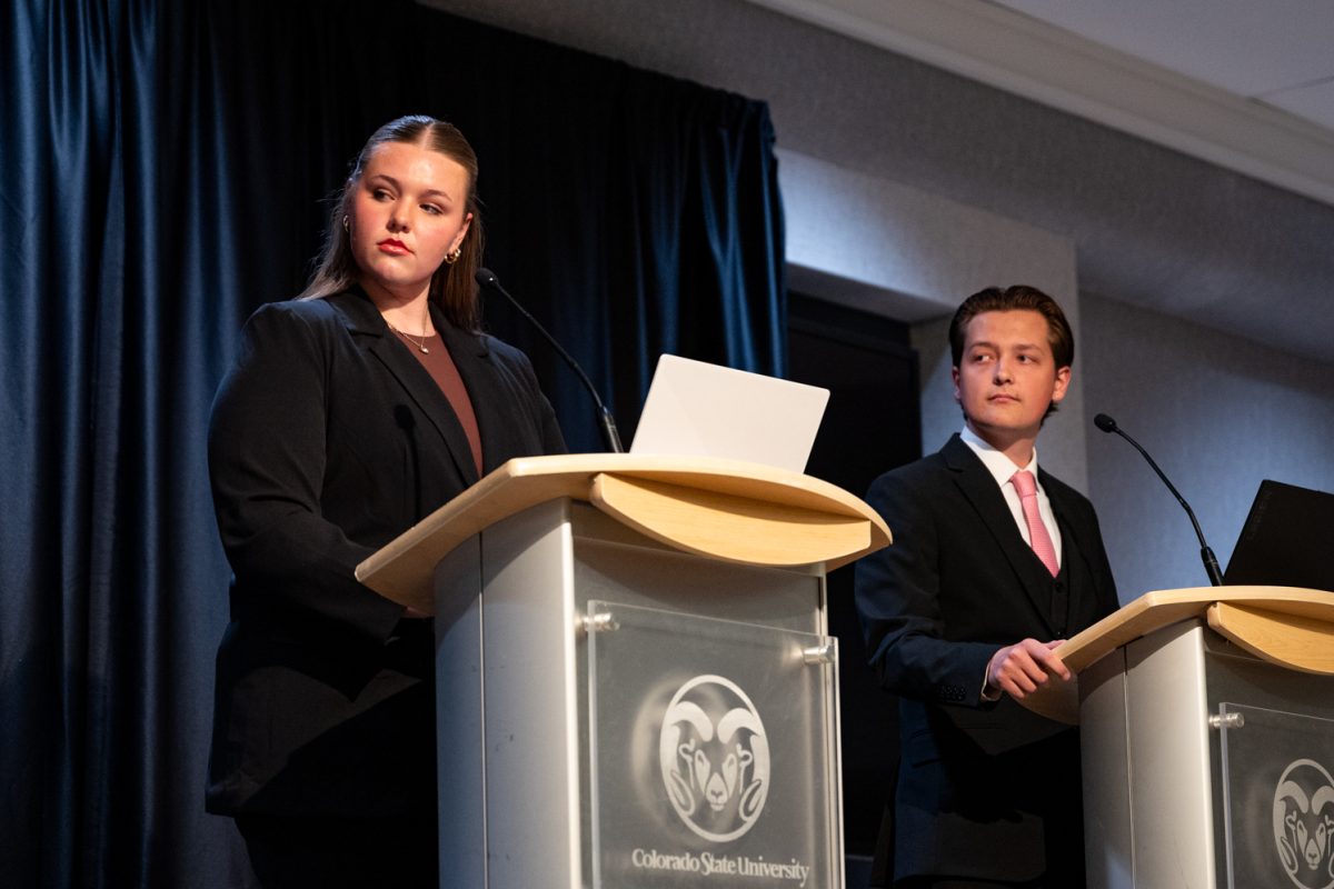 CTV hosts Bailey Borkowski and Tate Paisley listen to the candidates' opening remarks at the ASCSU Speaker of the Senate Debate.