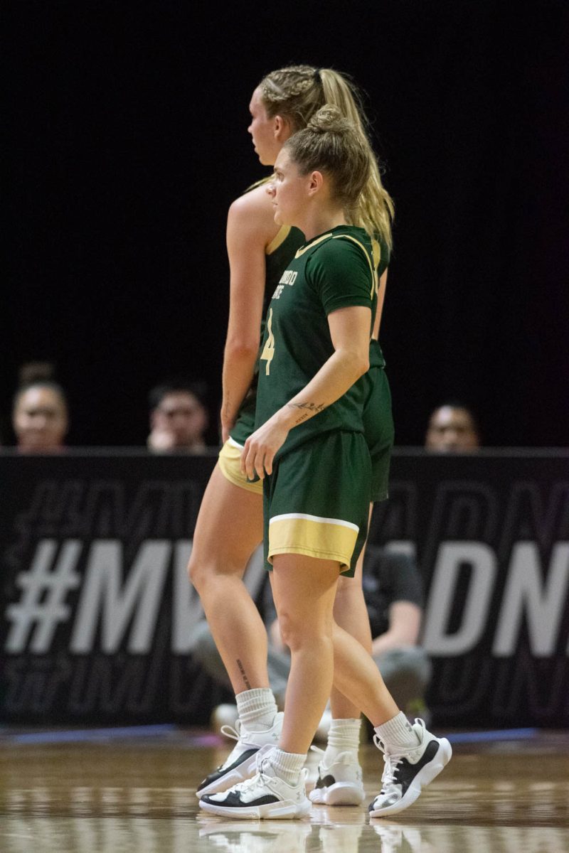 CSU athletes McKenna Hofschild and Hannah Ronsiek await a throw in during the CSU vs. Nevada game at the Mountain West womens basketball championship on March 11. The Rams won 65-54.