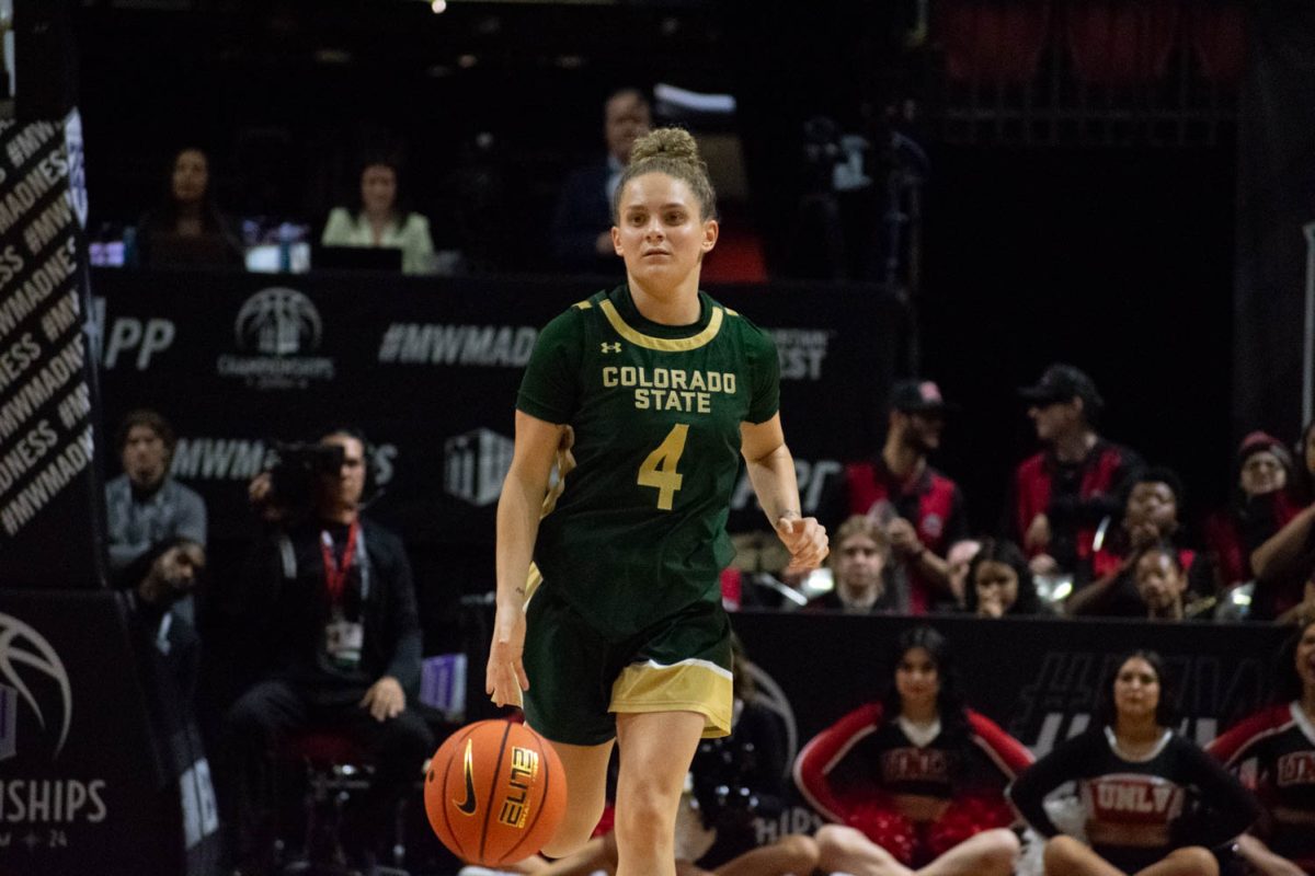 Colorado State University guard McKenna Hofschild dribbles the ball down the court in the Mountain West Womens Basketball Championships. The Rams played UNLV, losing 62-52.