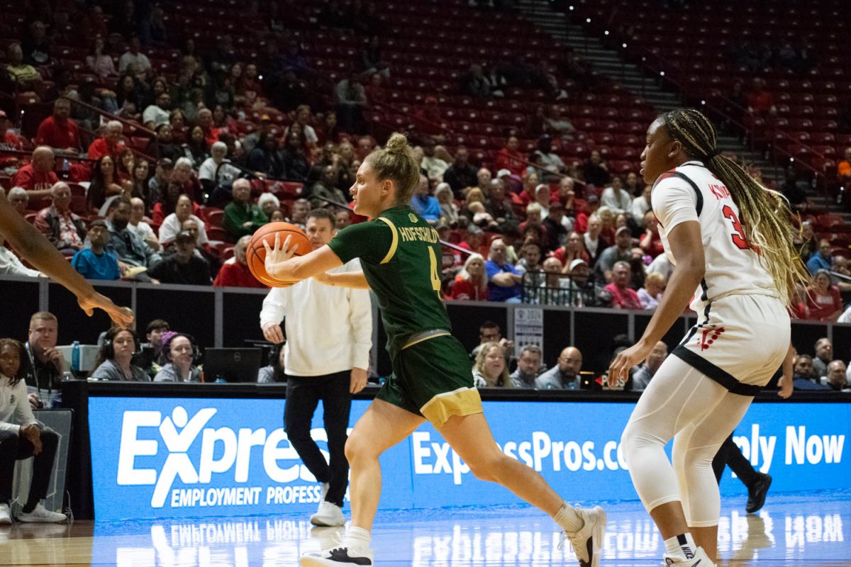CSU guard McKenna Hofschild throws a pass during the Mountain West womens basketball championship quarterfinal game against UNLV on March 12. The Rams ended up losing the game 62-52.