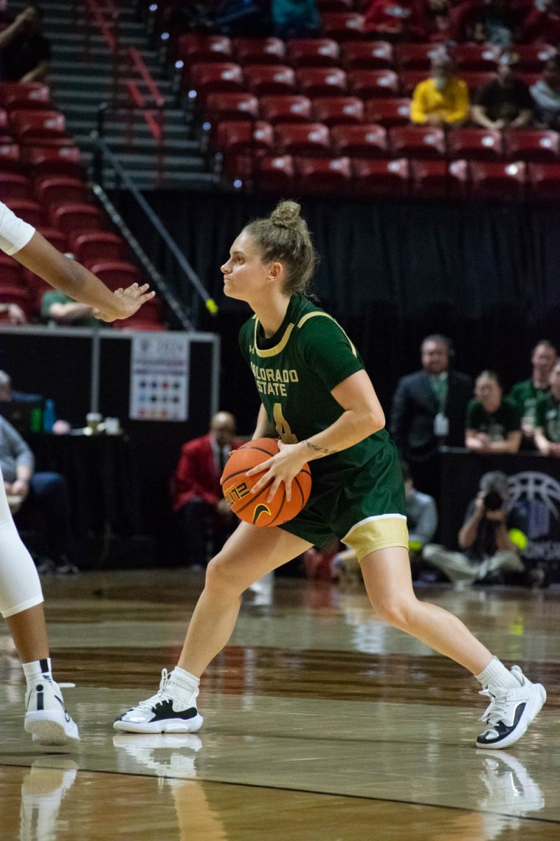 CSU guard McKenna Hofschild looks for a pass during the Mountain West womens basketball championship quarterfinal game against UNLV on March 12. The Rams ended up losing the game 62-52.