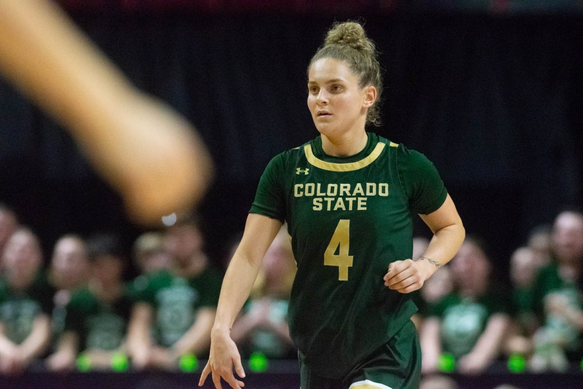 Colorado State University guard McKenna Hofschild dribbles the ball down the court during the Mountain West womens basketball championship quarterfinal game of CSU against the University of Nevada, Las Vegas March 12. The Rams lost 62-52.