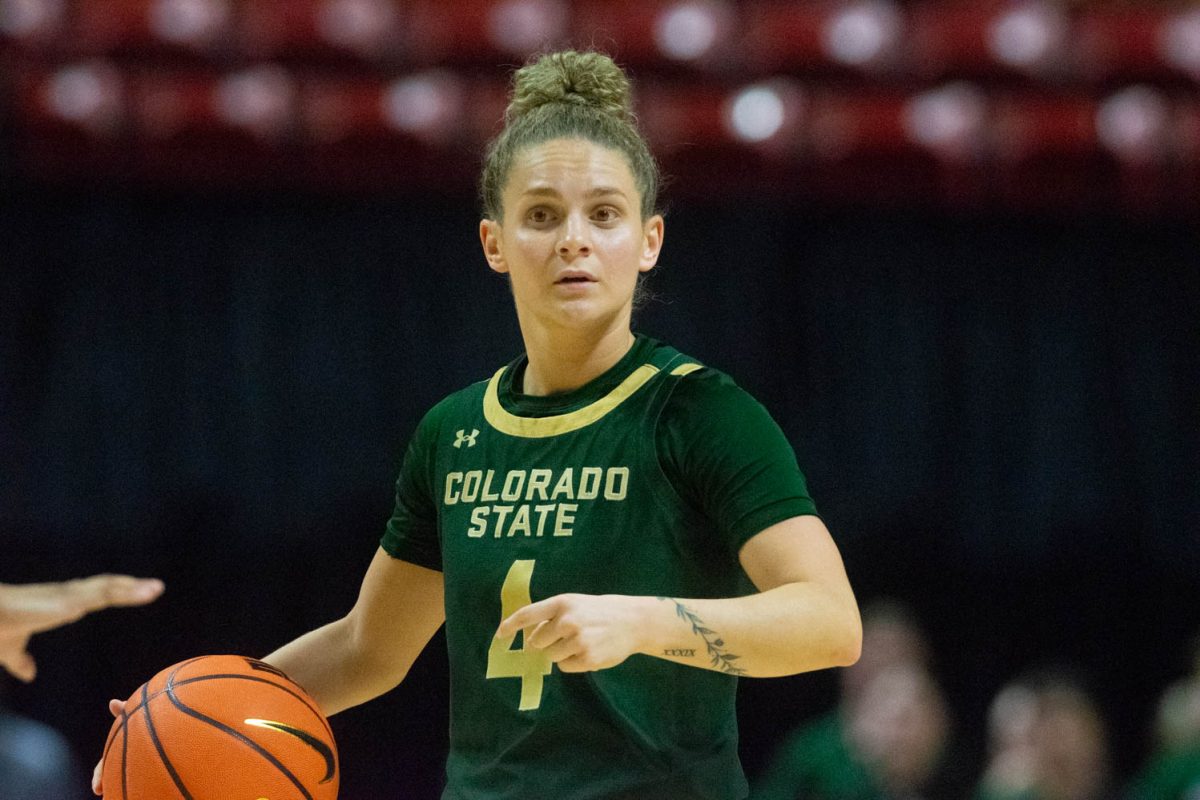 CSU guard McKenna Hofschild dribbles the ball down the court during the Mountain West womens basketball championship quarterfinal game against UNLV on March 12. The Rams ended up losing the game 62-52.