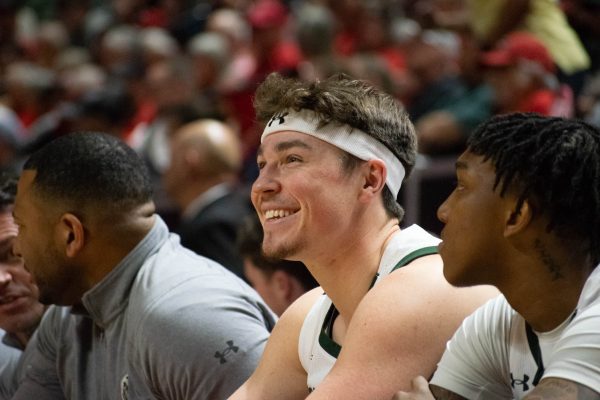 Colorado State University guard Joe Palmer smiles after a play in a CSU mens basketball game against San Jose State University during the Mountain West championships March 13. CSU won 72-62.