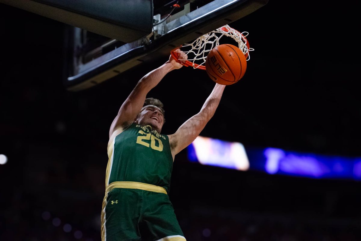 Colorado State University guard Joe Palmer dunks in a Mountain West mens basketball championship game between CSU and the University of Nevada, Reno March 15. CSU won 85-78.