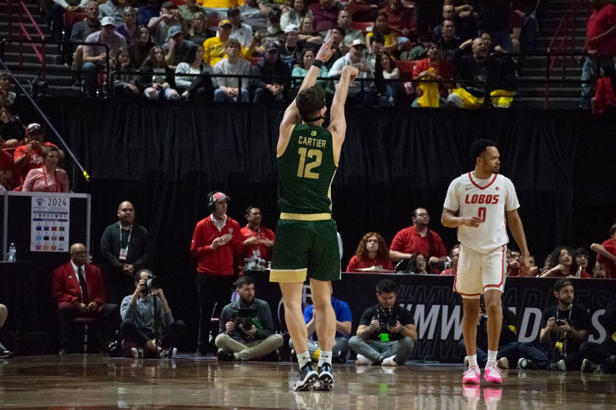 CSU Forward Patrick Cartier shoots a 3-pointer during the CSU vs. New Mexico game in the Mountain West mens basketball championship semi-final game on March 15. CSU lost 74-61.