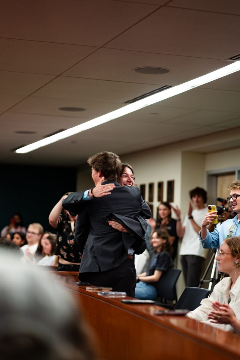 ASCSU President-elect Nick DeSalvo and Vice President-elect Braxton Dietz hug after winning the election Wednesday, April 3.