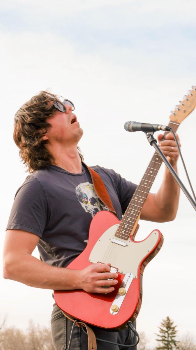 Colin Kelly of Jesus Christ Taxi Driver gives the audience an emotionally charged guitar solo at Colorado State University April 4.