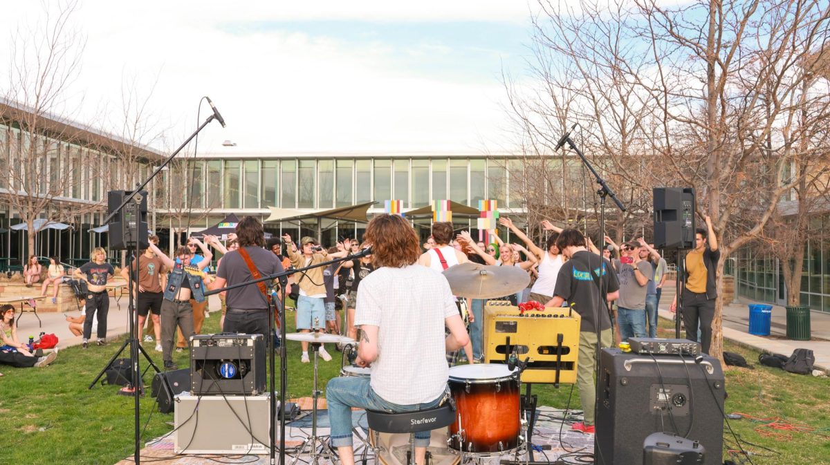 Jesus Christ Taxi Driver gets the crowd involved at Fools Fest at Colorado State University April 4.