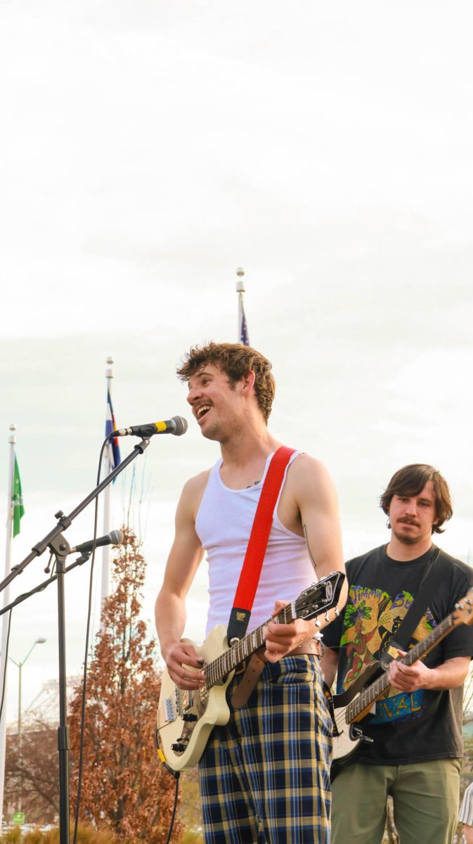 Ian Ehrhart of Jesus Christ  Taxi Driver sings while Riley Merino plays bass at Fools Fest at Colorado State University April 4.