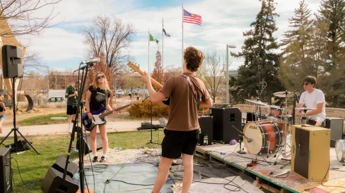 From left to right, Riley Hilbert, Jenison Brown and Aedyn Simon jam at Fools Fest at Colorado State University April 4.