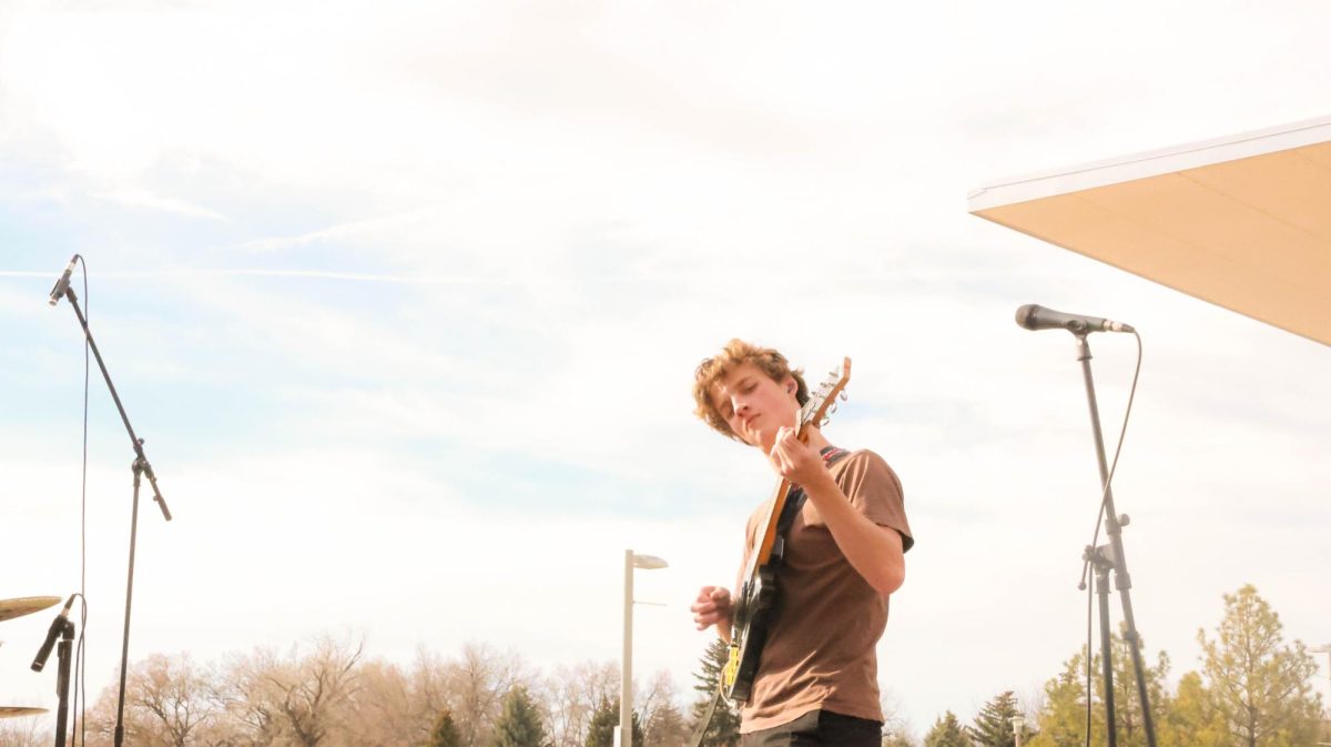 Jenison Brown of The Skratchmen gives the audience a raunchy guitar solo during Fools Fest at Colorado State University April 4.