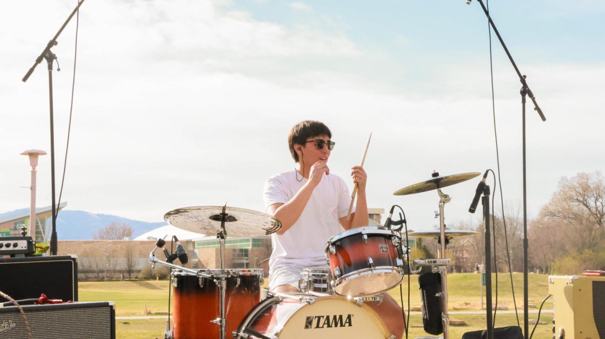 Aedyn Simon, drummer for The Skratchmen, plays during Fools Fest at Colorado State University April 4. 