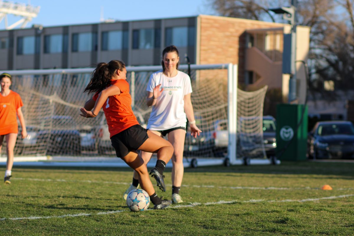 Natalie Joralemon manuevers the ball away from her teammates April 11.