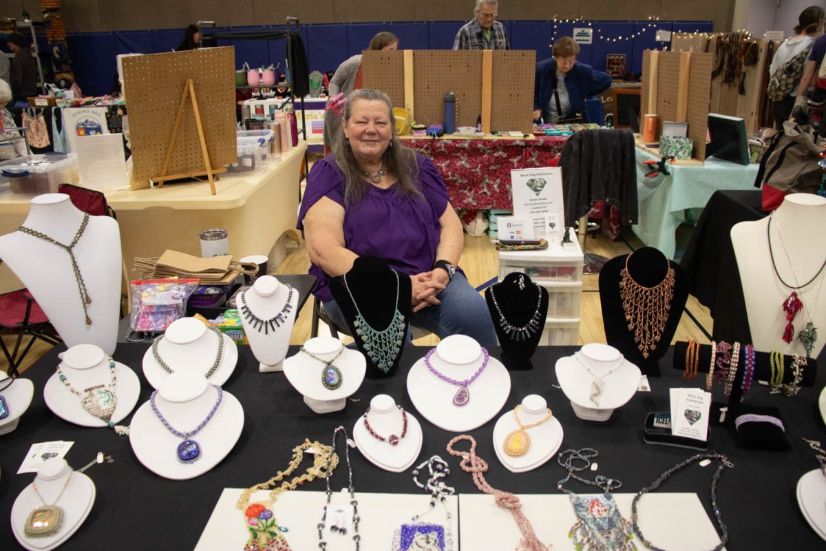 Wanda Sendek runs her booth of beaded jewelry and photographic prints during the Spring Artisan Market at Fort Collins Senior Center April 13.
