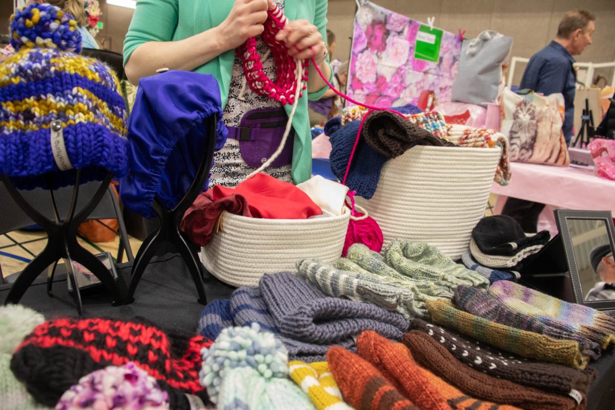 Michelle, owner of Curly Knits, works on a piece during the Spring Artisan Market at Fort Collins Senior Center April 13.