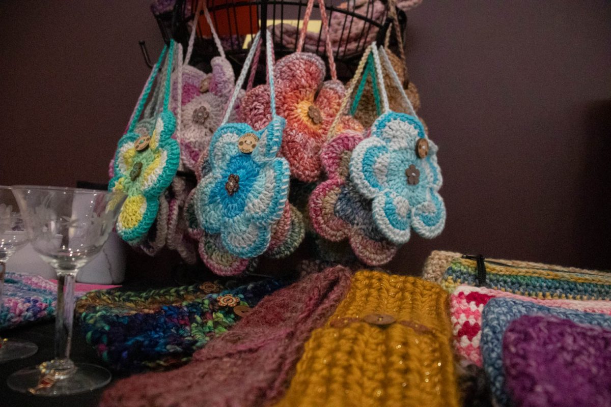 Crochet items for sale sit on display from the shop 'Lovely Flower Designs' sit on display during Ceramics sit on display during the Spring Artisan Market at Fort Collins Senior Center April 13.