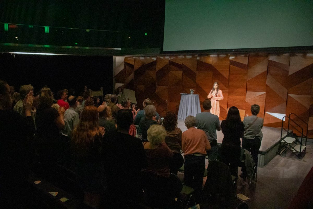 The crowd gives a round of applause following Valarie Kaur's presentation of "Building Bridges with 'Revolutionary Love" at the Lory Student Center Theater April 16.