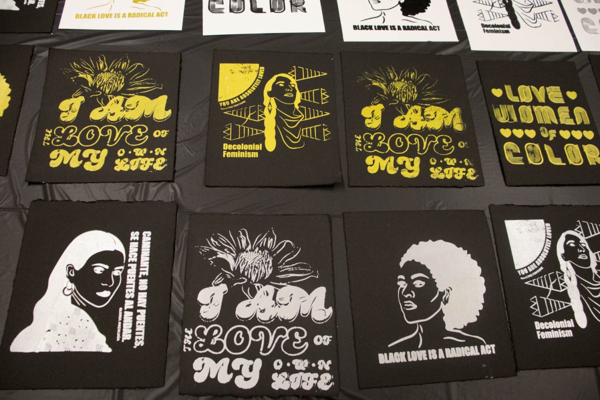 Prints are laid out to dry during the Love Women of Color: Celebrating Empowerment Through Art screen printing workshop April 18.