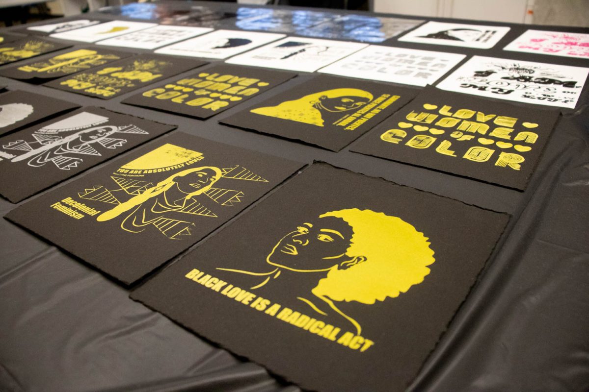 Prints are laid out to dry during the Love Women of Color: Celebrating Empowerment Through Art screen printing workshop April 18.