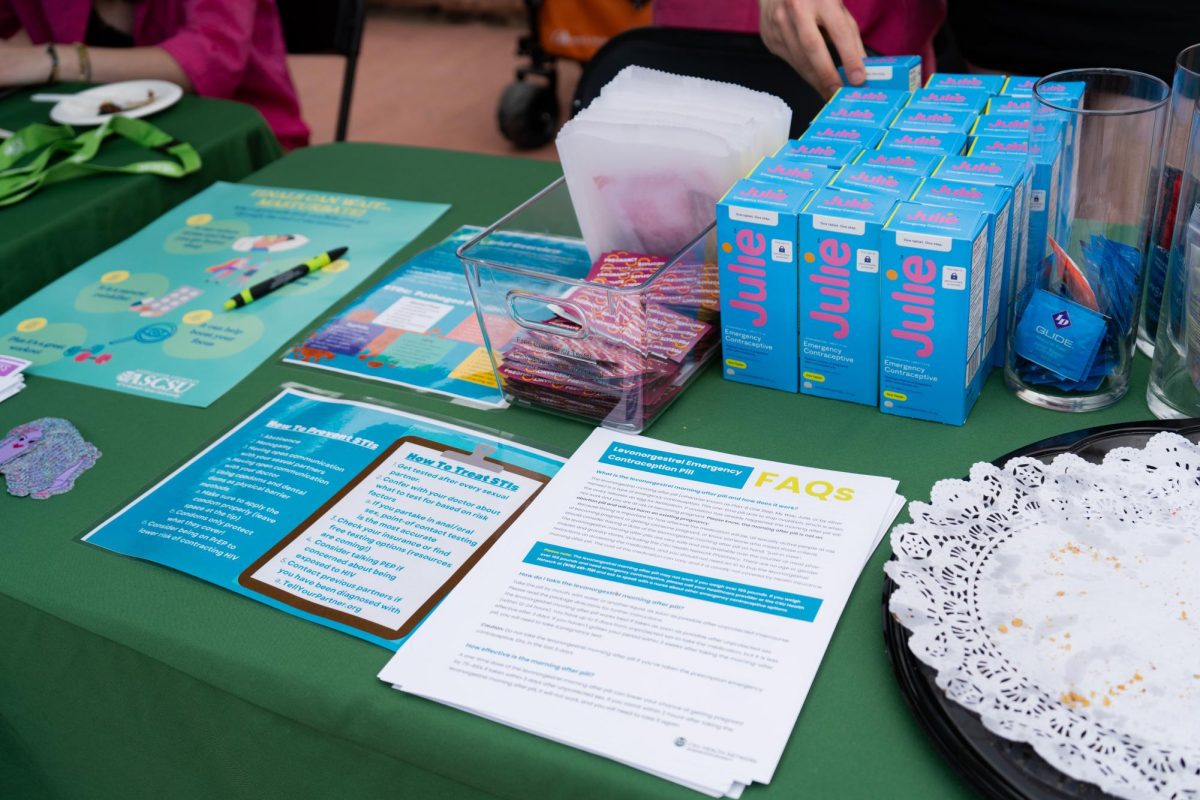 Boxes of emergency contraceptives being handed out for free by the Associated Students of Colorado State University on the Lory Student Center Plaza Wednesday, April 24. The table also had informational sheets about sexual healthcare and other free contraceptives.