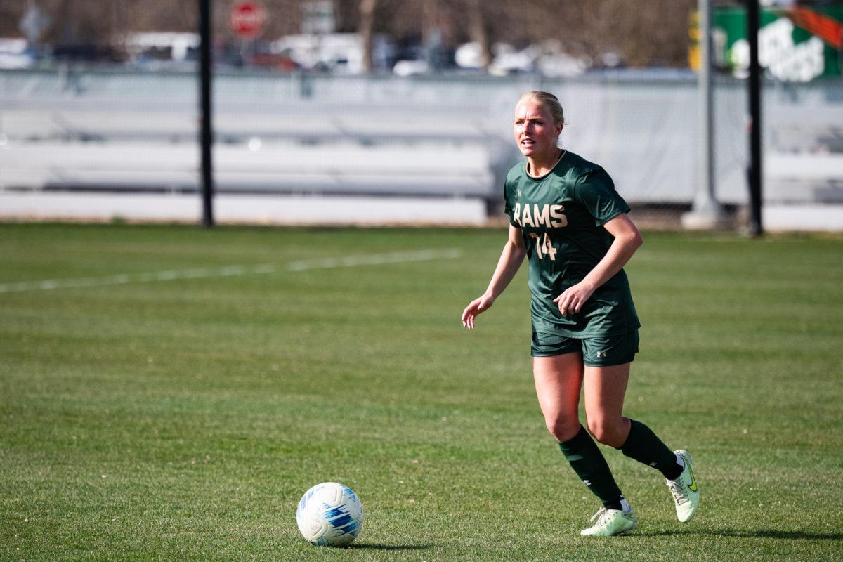 Midfielder Katy Coffin (14) looks to pass the ball during Colorado State Universitys game against Metro State.