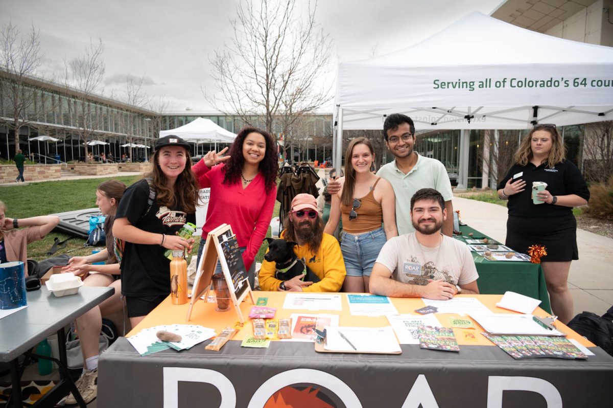 Anna Homsey (Far Left), Besma Cary (Left), Lief Youngs (left Center), Jennifer Litzau (Right Center), Aniket Tomar (Right) and Solomon Carpenter (Far right) in front of the ROAR (Rams Organizing for Animal Rights) table. ROAR advocates for sustainability for animals, humans, and the environment, and animal activism. Earth Day Festival April 22