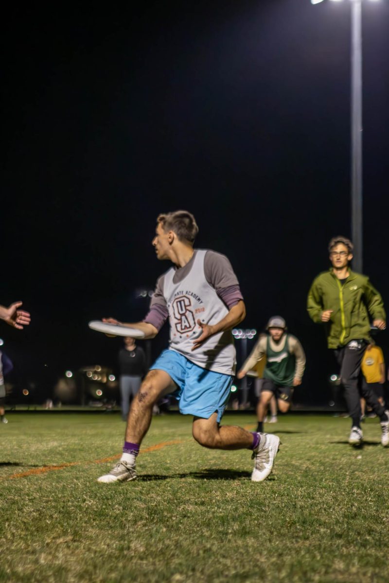 A member of the Colorado State University Mens Ultimate Frisbee club team, "Hibida" looks for a teammate to throw the frisbee to during a scrimmage. Apr. 4