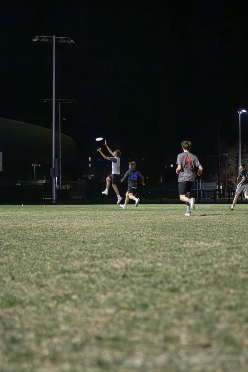 A member of the Colorado State University Mens Ultimate Frisbee club team, "Hibida" jumps to catch the frisbee at practice. Apr. 4.