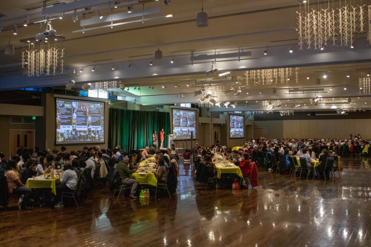 Lūʻau guests enjoy their food and each others company while students present on the Asian Pacific American Cultural Center's history at Colorado State University. Apr. 20.