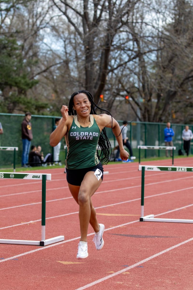Makayla Williams runs in the women's 400 meter hurdles at the Doug Max Invitational.