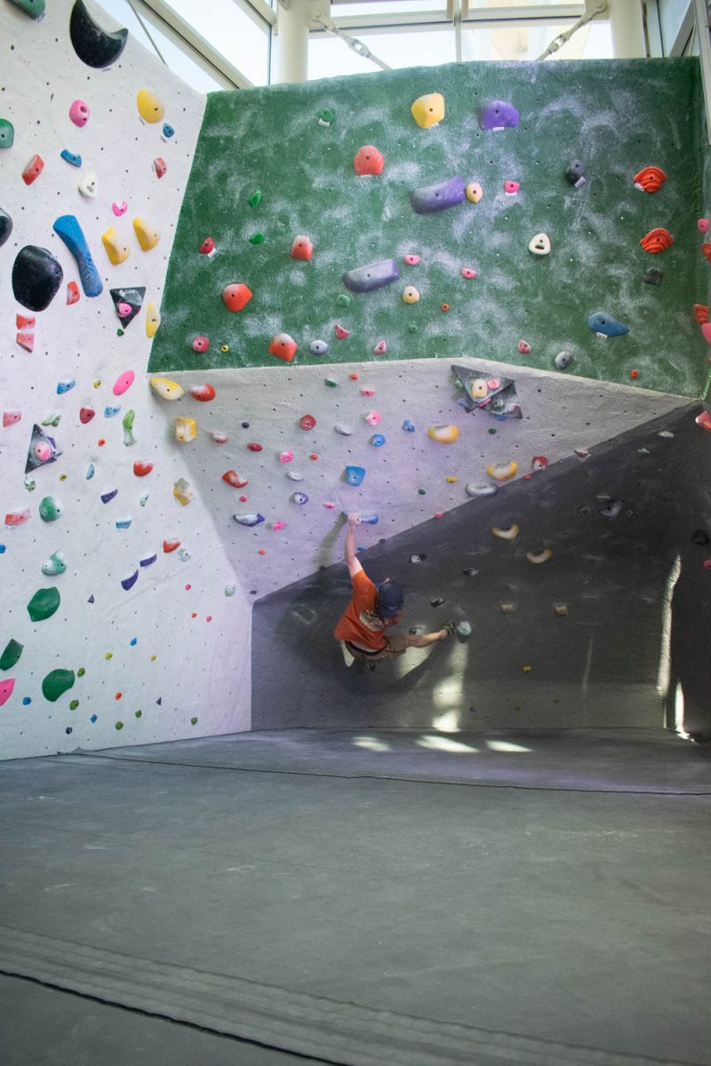 Colorado State University student Chris Harrison climbs at the CSU Student Recreation Center climbing wall on April 2, 2024.