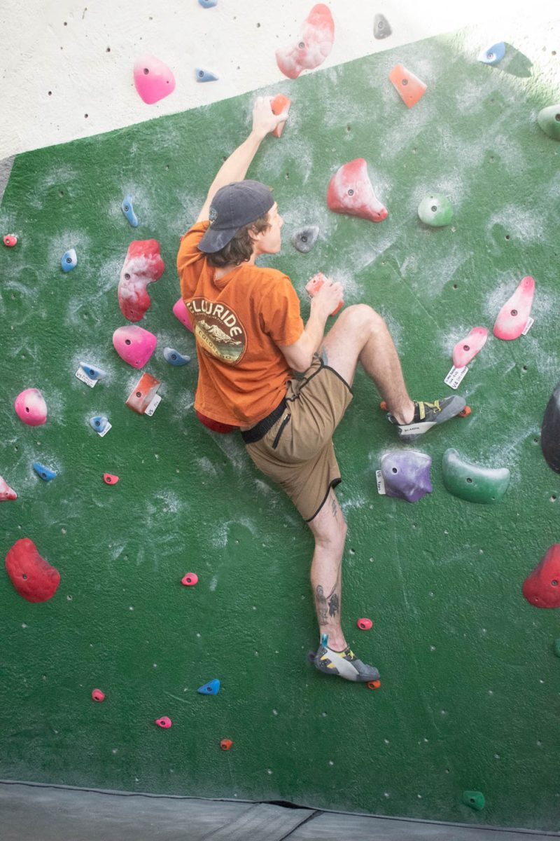Colorado State University student Chris Harrison climbs at the CSU Student Recreation Center climbing wall on April 2, 2024.