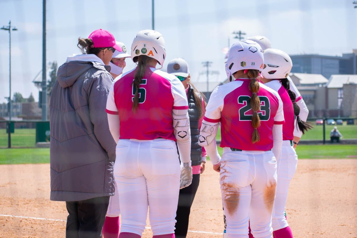 Part of the Colorado State University softball team huddles together during a break in the Rams double header against San Jose State University on April 21 at the CSU Softball Complex. The Rams won both games 16-0 and 14-0 respectively.
