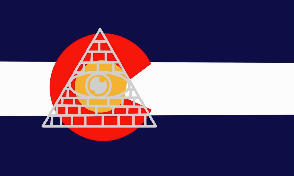 The Colorado flag with an symbol of a pyramid and an eye on top of the letter C.