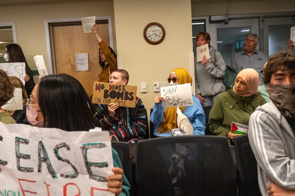 Students for Justice in Palestine protestors gather in the Associated Students of Colorado State University senate chambers before the May 1 senate session. Protestors called during public comment for President Nick DeSalvo to sign bill #5319, the Humanity and Community Act. Bill #5402, a re-submission of #5319, will be put before ASCSU emergency session on May 3. 