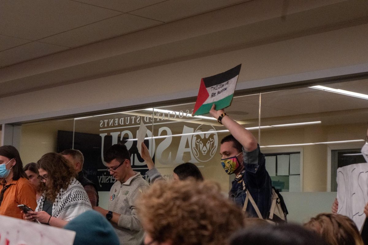 Students for Justice in Palestine protestors gather in the Associated Students of Colorado State University senate chambers before the May 1 senate session. Protestors called during public comment for President Nick DeSalvo to sign bill #5319, the Humanity and Community Act. 