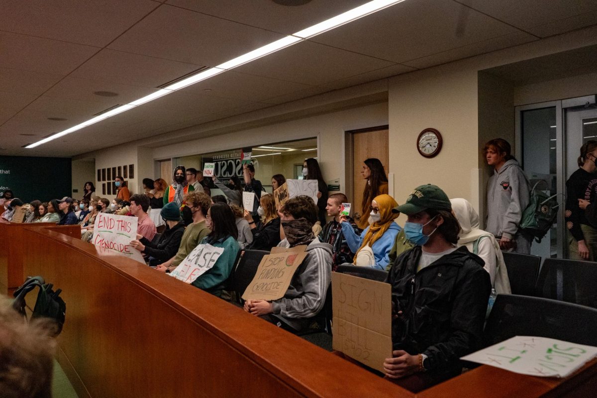 Students for Justice in Palestine protestors gather in the Associated Students of Colorado State University senate chambers before the May 1 senate session. Protestors called during public comment for President Nick DeSalvo to sign bill #5319, the Humanity and Community Act. 